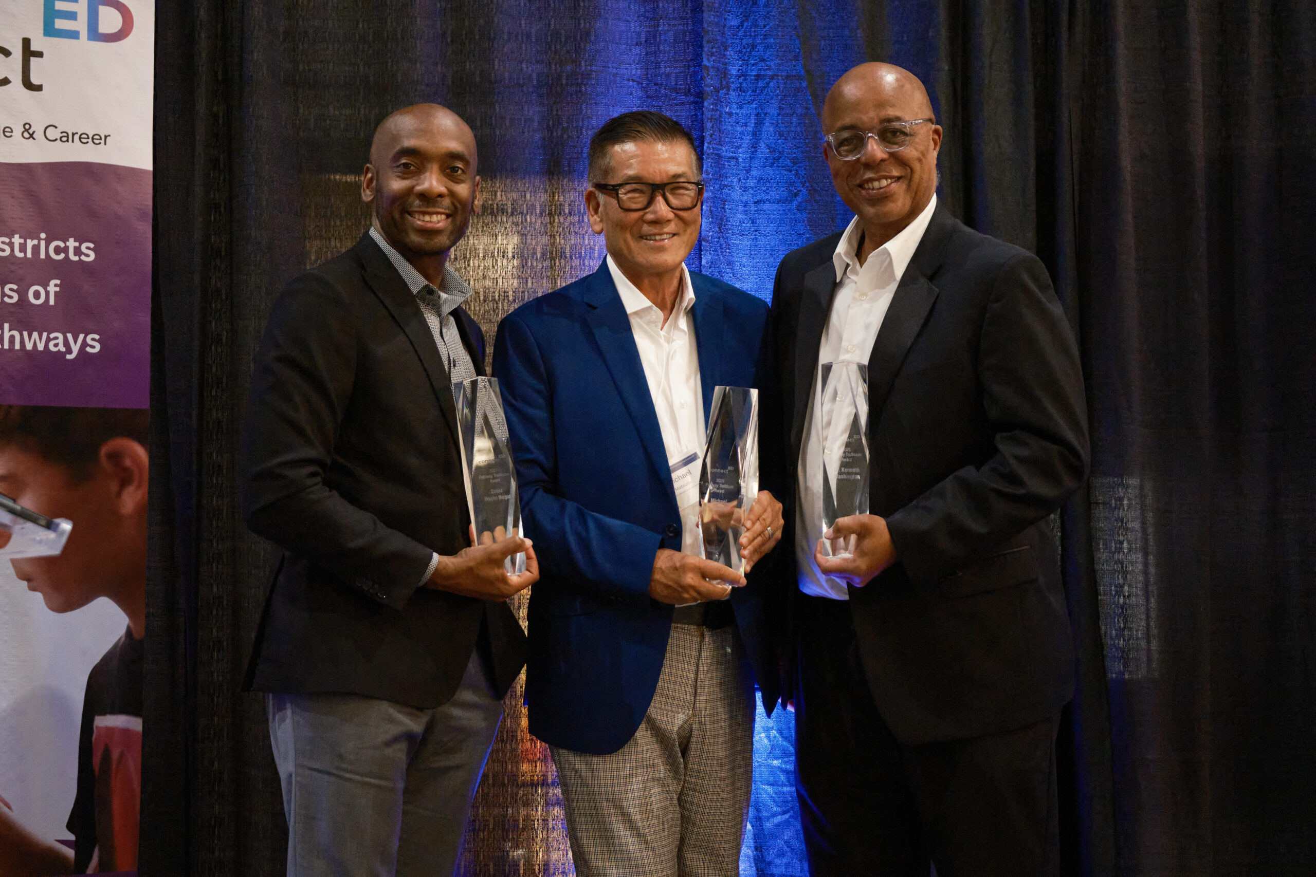 Michael Crome (on behalf of Sandra Douglass Morgan), Michael Matsuda and Dr. Kenneth Washington, accepting the 2025 Trailblazer award.